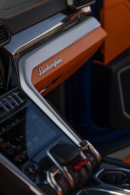 Burnt orange and black Lamborghini Urus luxury SUV interior