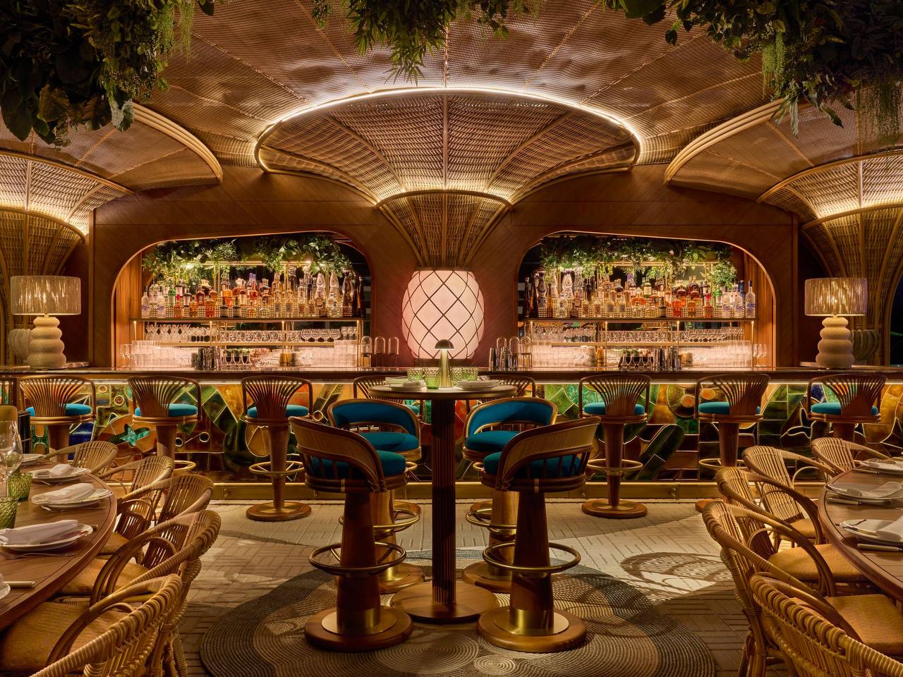 Luxury Art Deco restaurant interior with elegant bar seating and ambient lighting